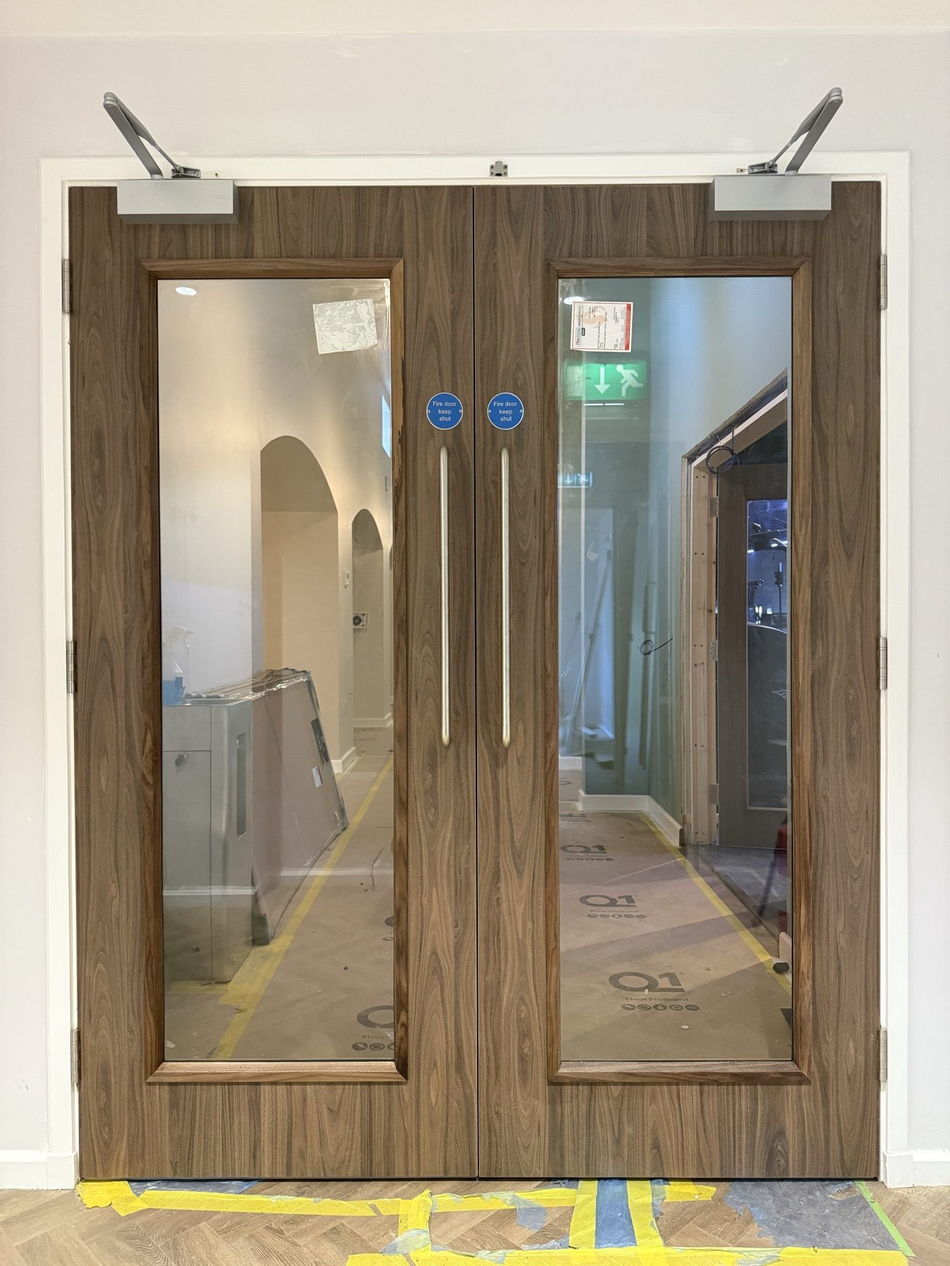 Glazed double doors during installation at Theobalds Health Club