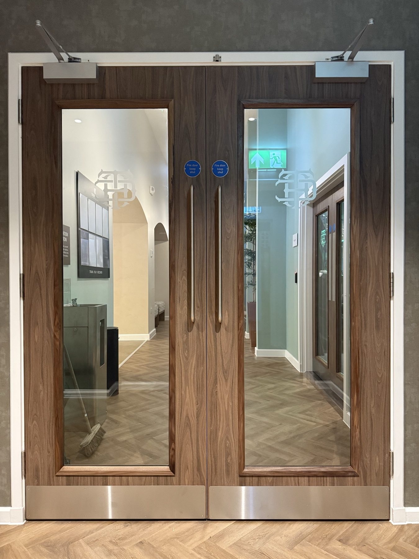 Finished glazed doors in a Theobalds Health Club corridor