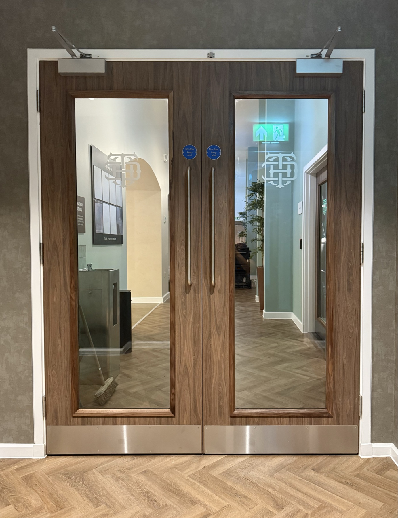 Finished glazed double doors in the health club